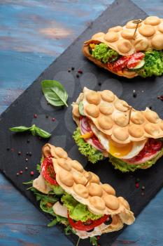 Delicious bubble waffles on slate plate�