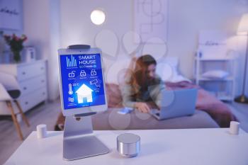 Tablet computer with application of smart home automation and assistant device in bedroom�