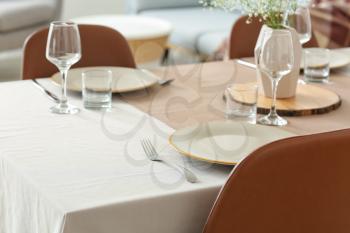 Served table in modern dining room�