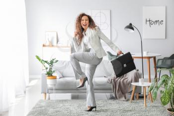 Happy businesswoman before weekends at home�