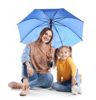 Mother and little daughter with umbrella on white background�