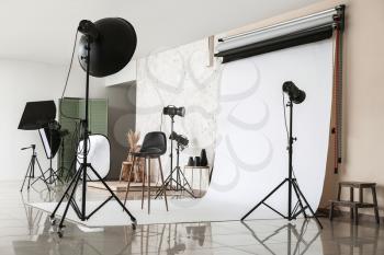 Interior of photo studio with modern equipment�