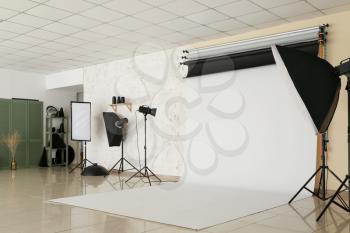 Interior of photo studio with modern equipment�