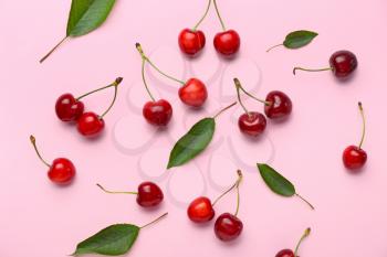 Ripe sweet cherry on color background�