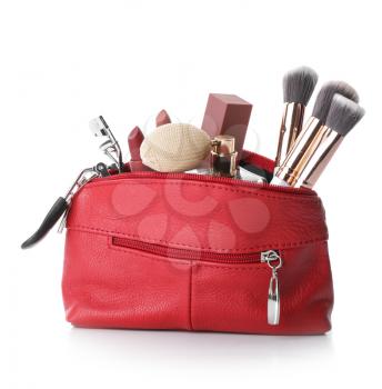 Makeup bag with decorative cosmetics on white background�