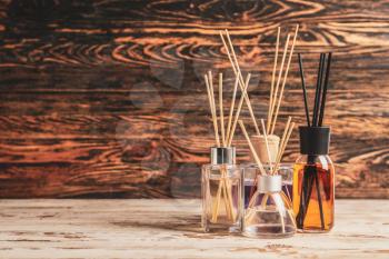 Different reed diffusers on table�