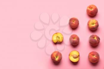 Sweet peaches on color background�