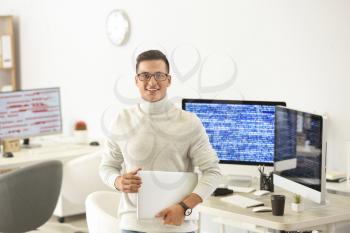 Portrait of male programmer in office�