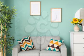 Interior of room with photo frames�