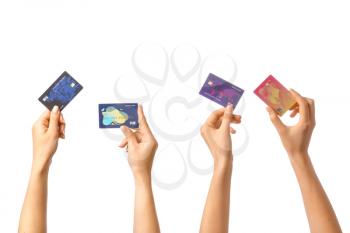 Female hands with credit cards on white background�