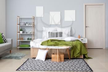 Stylish interior of modern bedroom�