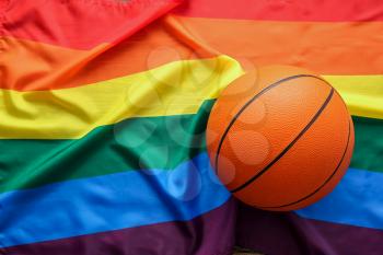 Basketball ball against lgbt rainbow flag�