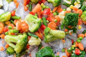Mix of frozen vegetables as background�