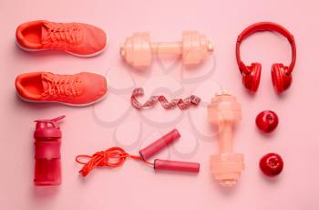 Sports equipment on color background�