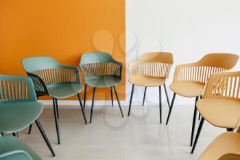 Empty chairs prepared for group therapy in psychologist's office�