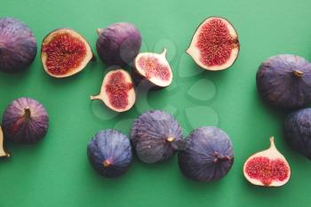 Composition with fresh figs on color background�
