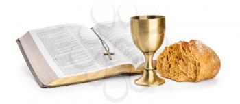 Holy Bible with bread and chalice of wine on white background�
