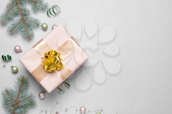 Beautiful Christmas decor with gift box on light background�