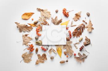 Beautiful autumn composition with empty card on white background�