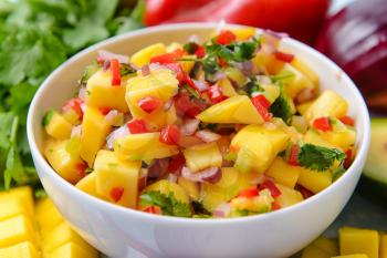Bowl with fresh mango salsa, closeup�