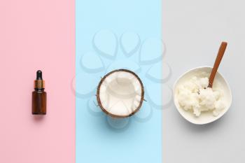 Composition with coconut oil on color background�