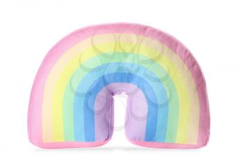 Soft pillow in shape of rainbow on white background�
