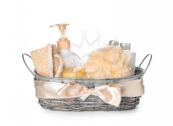 Gift basket with bathroom supplies on white background�