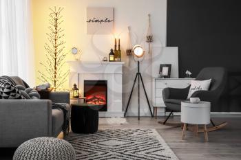 Interior of modern living room with fireplace�
