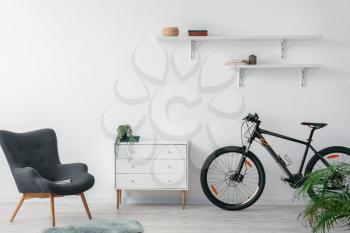Modern bicycle in interior of living room�