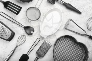 Set of kitchen utensils on light background�