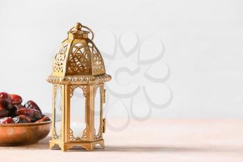 Muslim lamp and dates on light background�