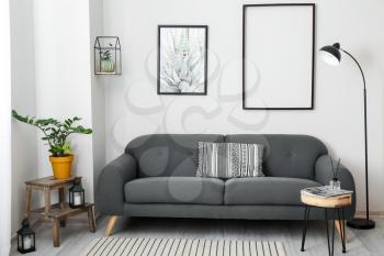 Interior of stylish living room with comfortable sofa�