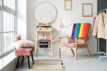 Armchair with flag of LGBT in interior of dressing room�