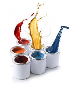 Cans of paints with splashes on white background�