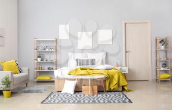 Stylish interior of modern bedroom�