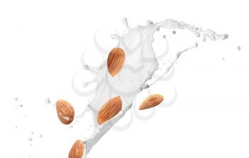 Splash of almond milk on white background�