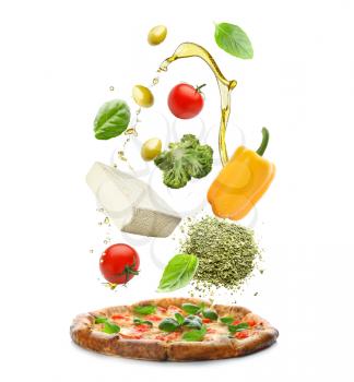 Tasty pizza with falling ingredients on white background�