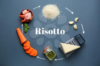 Raw ingredients for risotto on grey background�