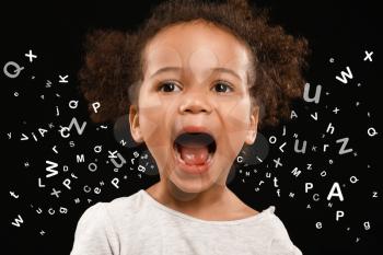 Screaming African-American girl and many letters on dark background�