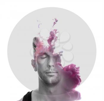 Double exposure of handsome man and splash of paints on white background�