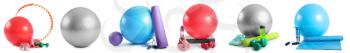 Set of sports equipment with fitness balls on white background�