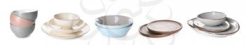 Set of clean dishware on white background�