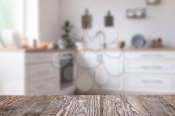 Empty wooden table in modern kitchen�
