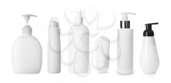 Set of different bottles on white background�