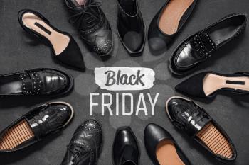 Female shoes and text Black Friday on dark background�
