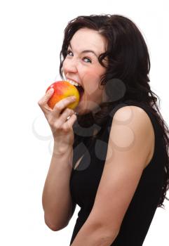 Royalty Free Photo of a Young Woman Eating an Apple