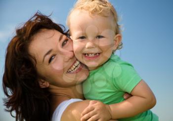 Royalty Free Photo of a Woman and Child Outside
