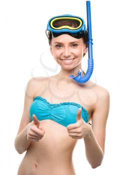 Young happy woman with snorkel equipment and showing thumb up sign using both hands, isolated over white