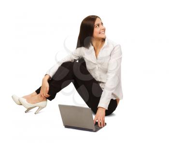 Royalty Free Photo of a Woman on the Floor With a Laptop