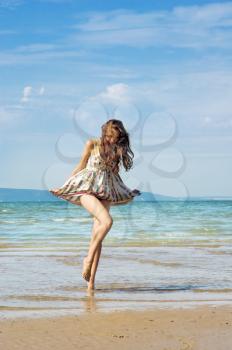 Royalty Free Photo of a Girl at the Beach